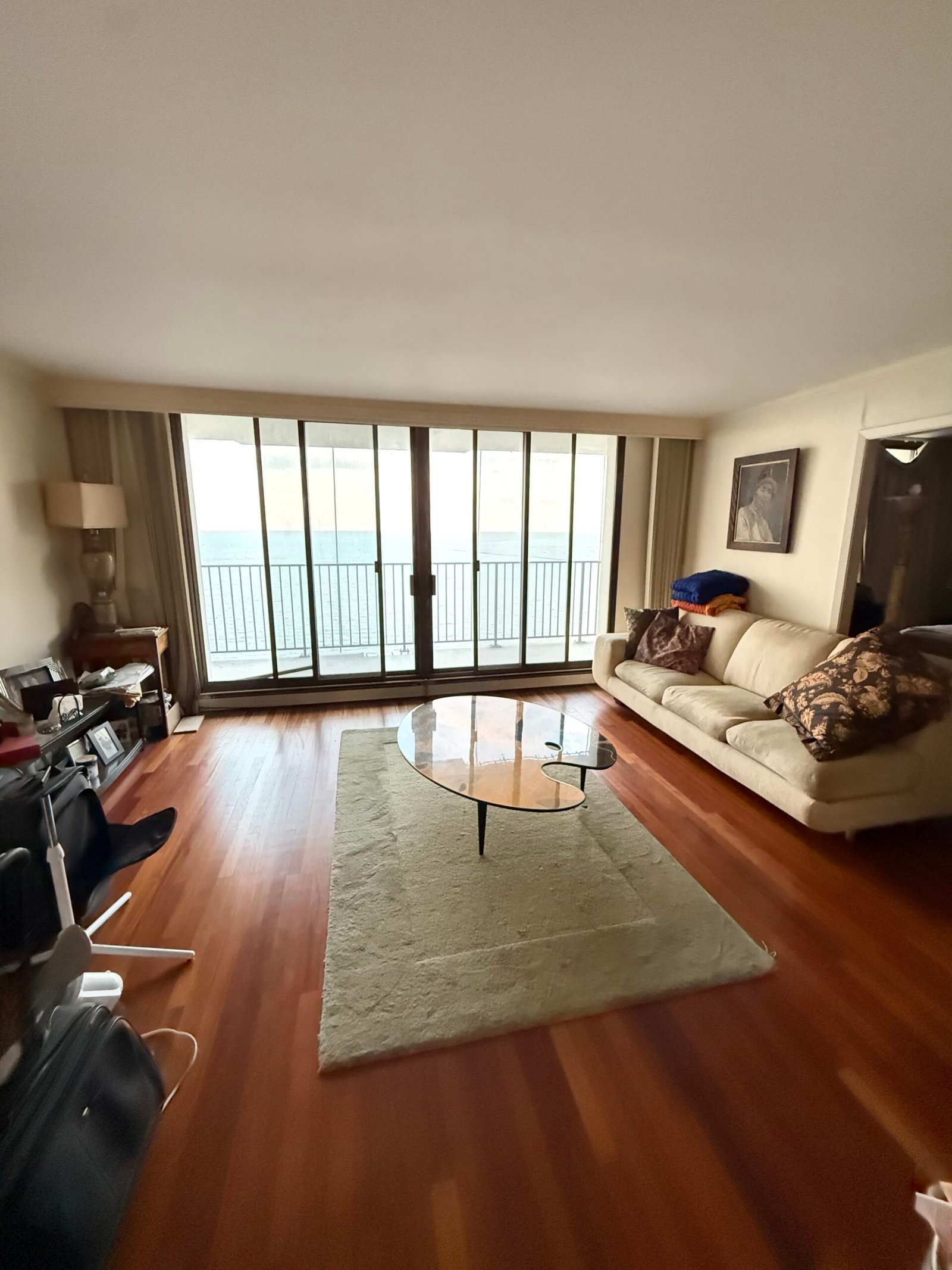 Clean River North style living room with hardwood floors